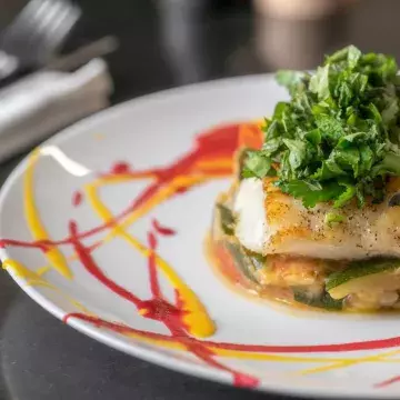 Restaurant Le Toî du Monde - Plat Cabillaud rôti au beurre d'ail